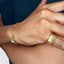 Men's chunky gold signet ring with smooth finish