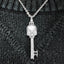 Stylish white gold skull key pendant with moissanite detail