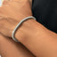 Minimalist 18K white gold diamond tennis bracelet with refined silhouette