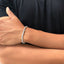 Unisex white gold diamond tennis bracelet styled for everyday wear
